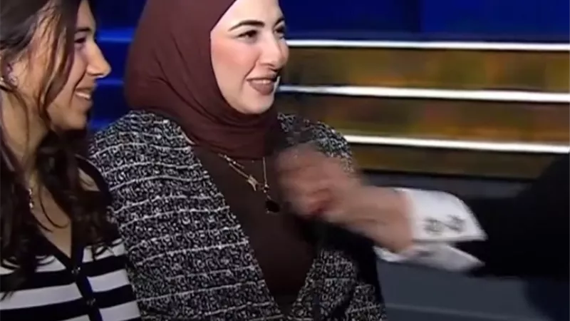زوجة الشهيد رامي هلال تشيد بدعم الرئيس وتؤكد الفخر بالمشاركة في عيد الشرطة