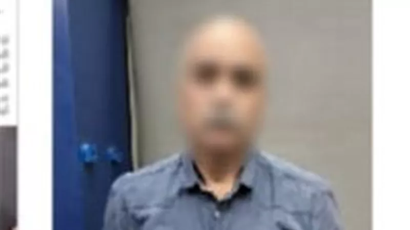 ضبط مهندس بعد اتهامه بسب جارته وإتلاف سيارتها بالنزهة
