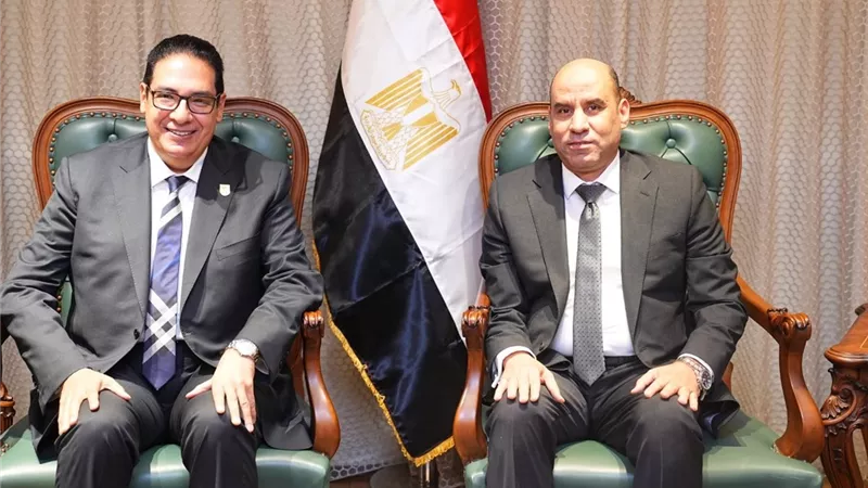 تعاون بين 